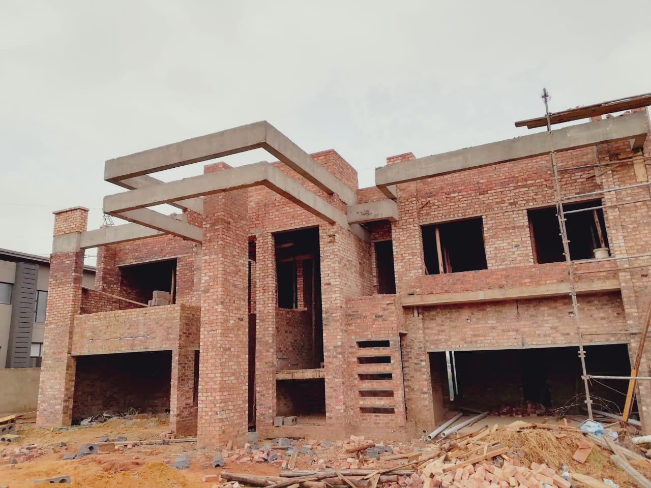 Double-storey brick house under construction by FWB Holdings
