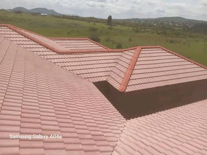 Completed tiled roof installation on a residential home
